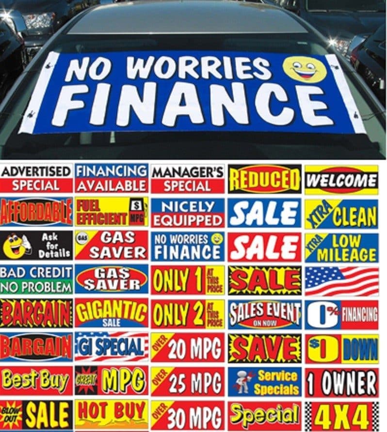 Slogan banners and decals on dealer lot vehicles